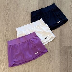 Girls Tennis Lot!  Nike Dry Fit Tennis Skirts and two tops (Skirts S Tops XS)